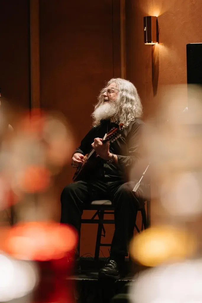 Oscar-winning composer Gustavo Santaolalla performing at the launch of the Ronroco fragrance at South Coast Plaza. Source: Getty