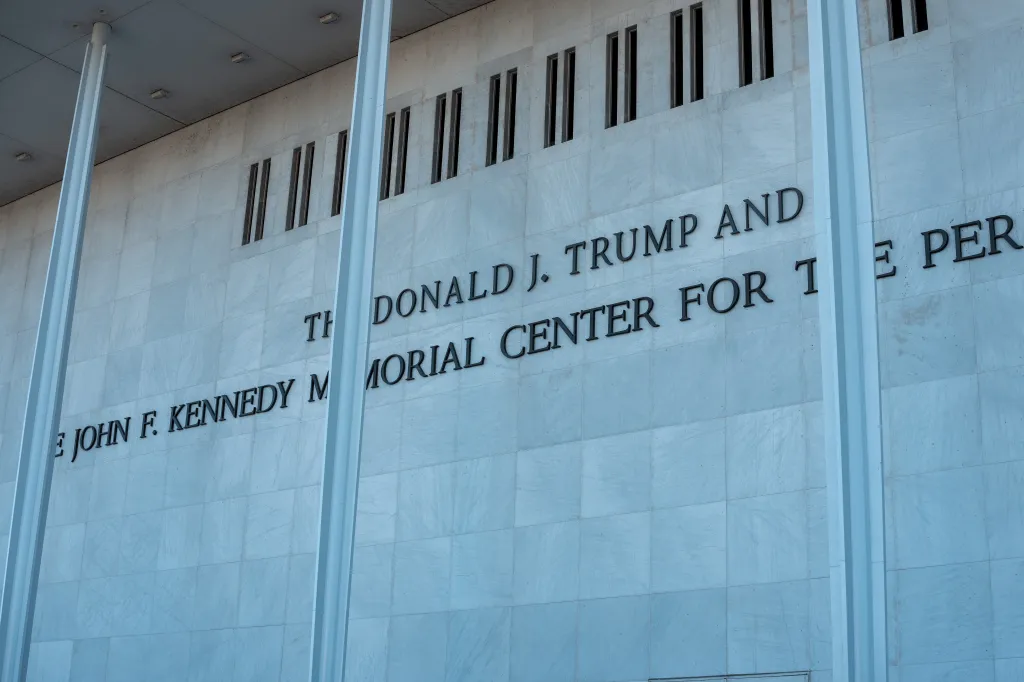 The name "Donald J. Trump" on the facade of the John F. Kennedy Memorial Center for the Performing Arts.