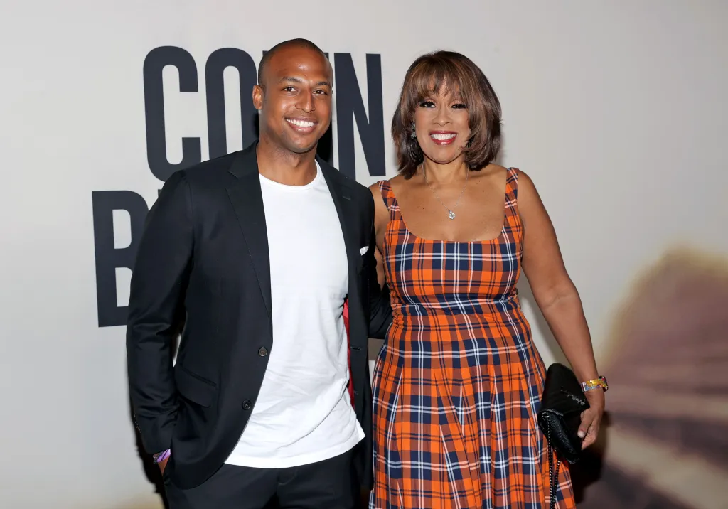 William Bumpus Jr. and Gayle King attending the premiere of "Colin in Black and White."