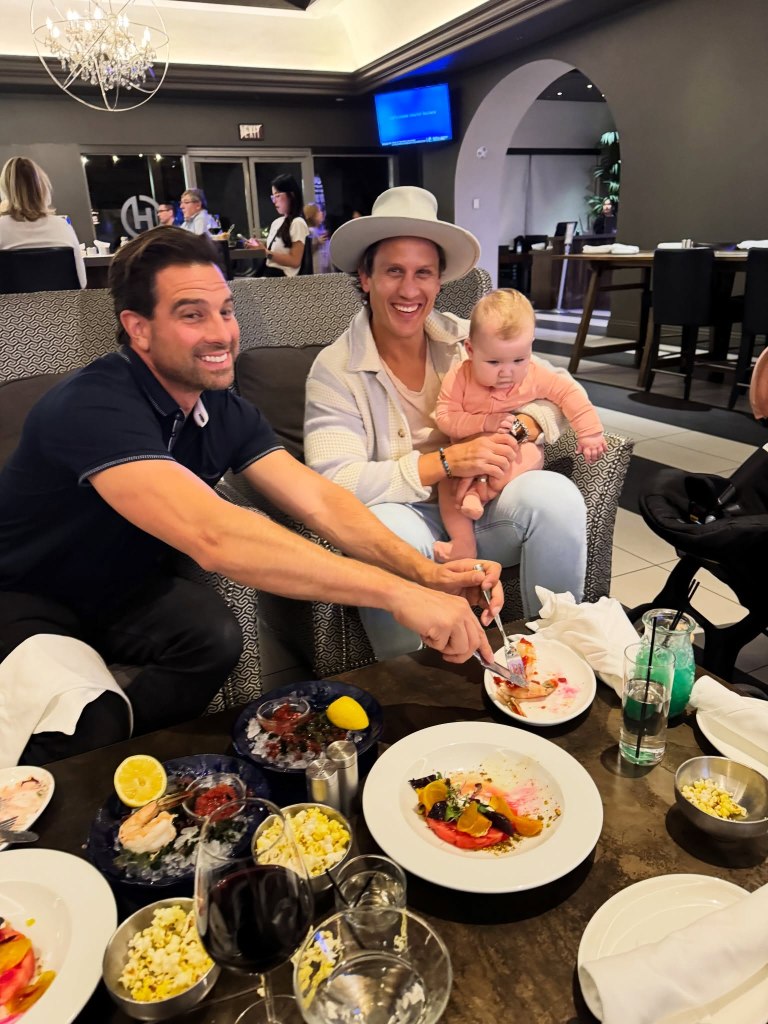 Scott McGillivray and Brooke Hogan's husband dining with a baby.