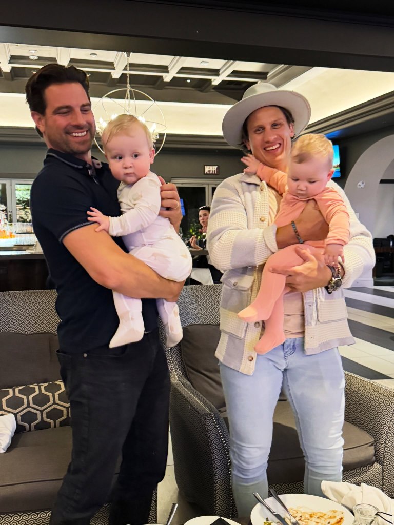 Scott McGillivray and Brooke Hogan's husband holding babies.