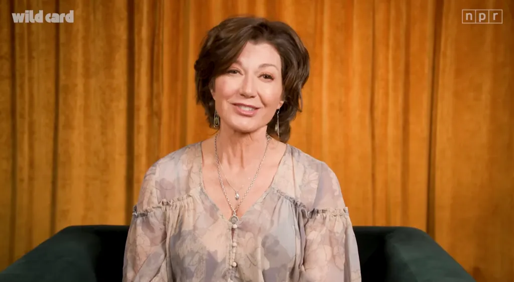 Amy Grant smiling during an interview with NPR's Wild Card.