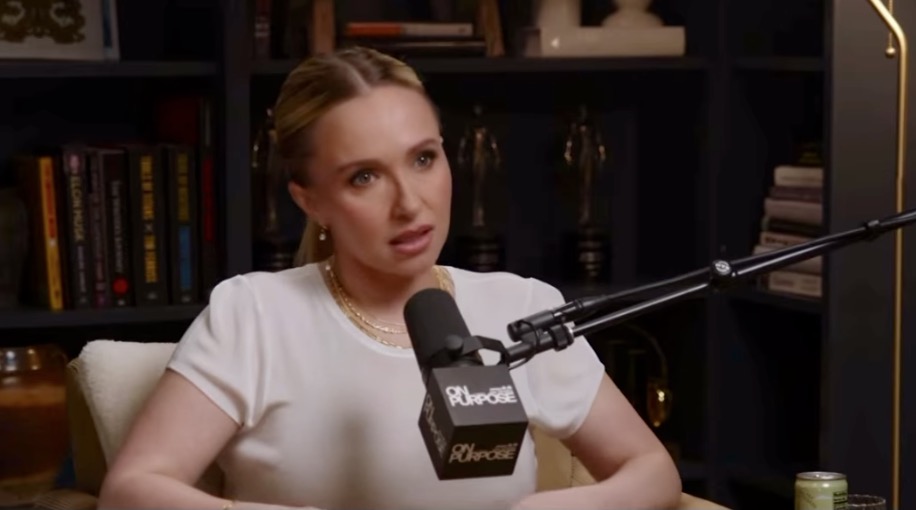Hayden Panettiere speaking into a "On Purpose" podcast microphone.