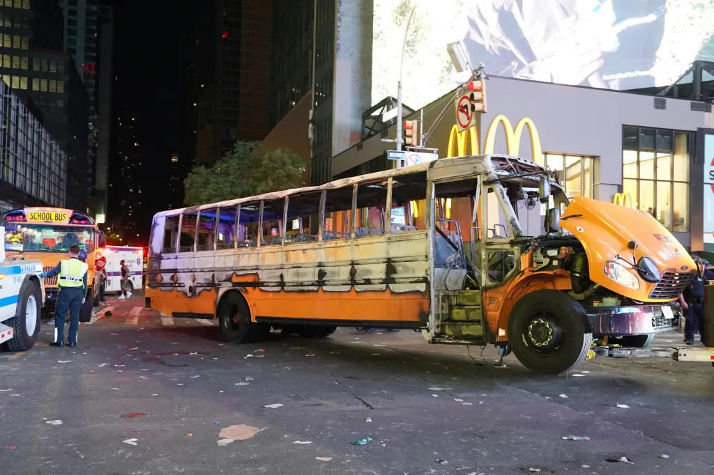 Damage caused by fans that set fire to a school bus and destroyed vehicles after the New York Knicks beat the San Antonio Spurs.