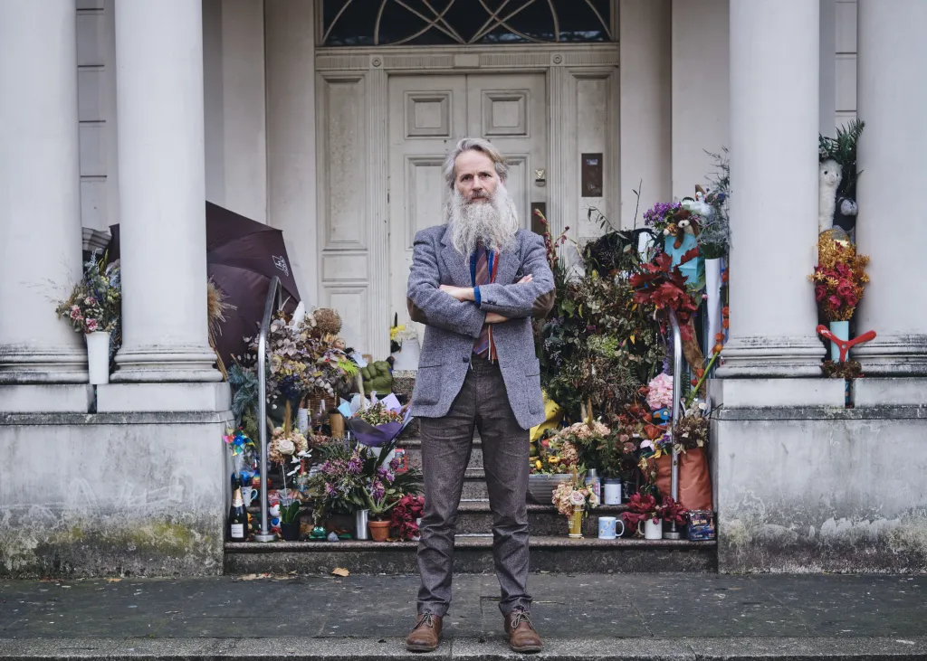 A homeless Swedish man named Anders Fernstedt has spent the past three years camping on its front porch with no running water.