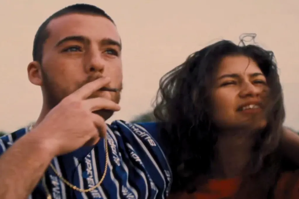 Actor Angus Cloud (Fezo) smoking with actress Zendaya (Rue) in "Euphoria."
