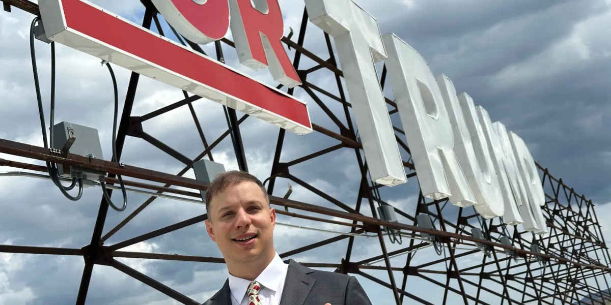 Upstate New York sticker mogul has a bronze Trump statue, MAGA hip-hop album and a presidential endorsement. The local machine wants the Marine