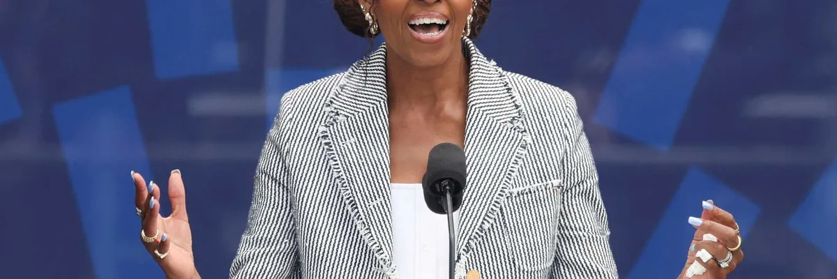 Chicago crowd cheers as Michelle Obama jabs Trump