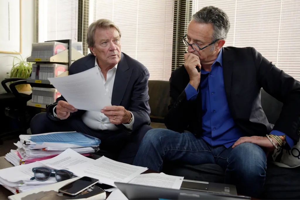 Steve Kroft and Michael Gavshon reviewing a script in the "60 Minutes" offices.
