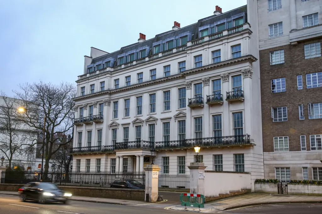 An automobile passes the mansion at 2-8a Rutland Gate, that sold for more than 200 million pounds ($262 million), in London, U.K., on Saturday, Jan. 25, 2020.