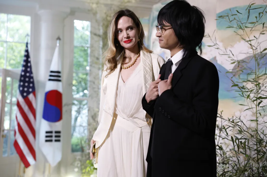 Actress Angelina Jolie and her son Maddox at a White House state dinner.
