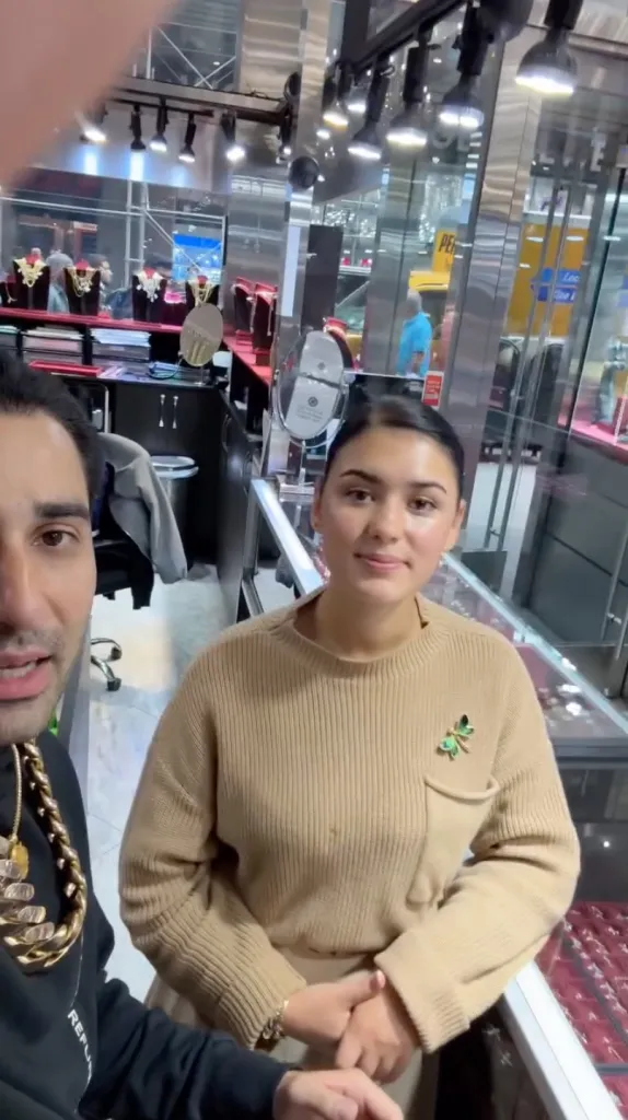 Maksud Agadjani and Melisa Kulla in a jewelry store.