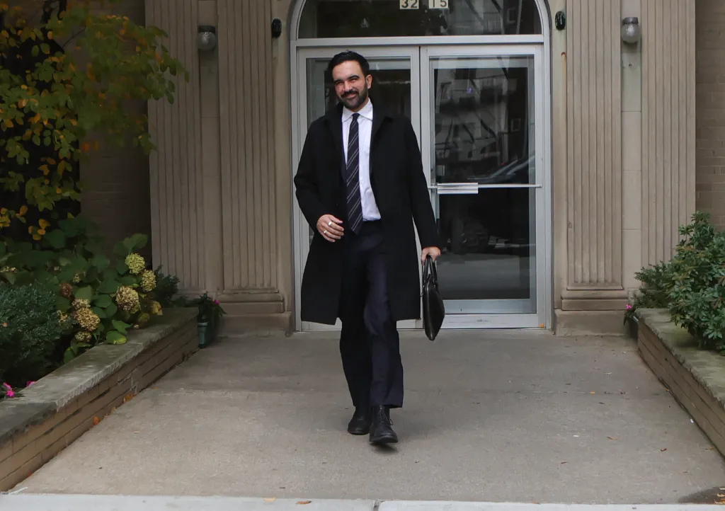 NYC Mayoral candidate Zohran Mamdani leaving his residence to campaign.