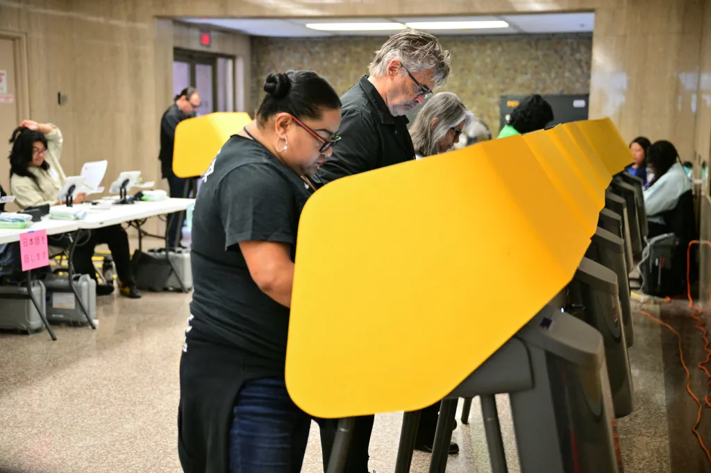 People vote at polling stations in Los Angeles, California during the state primary election.