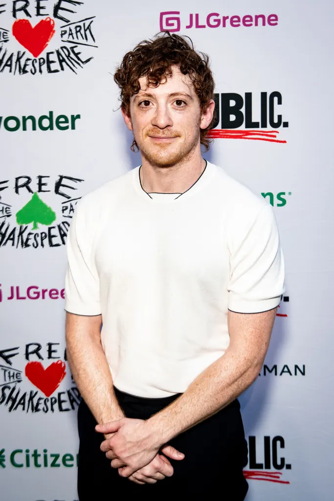 Ethan Slater, in a white T-shirt and black pants, at the opening night of "Romeo & Juliet" at Free Shakespeare in the Park.