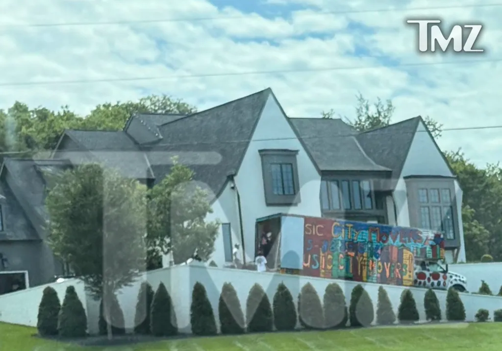 Movers at Jelly Roll's house.