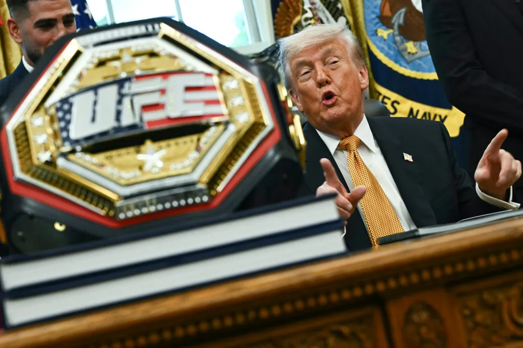 A UFC championship belt is displayed as US President Donald Trump speaks about the upcoming "UFC Freedom 250" event.