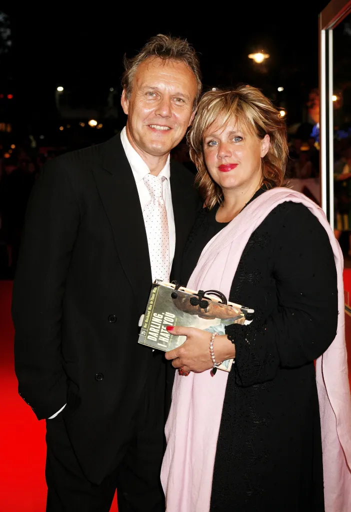 Actor Anthony Head and partner Sarah Fisher attend the charity gala screening of "The Devil Wears Prada".