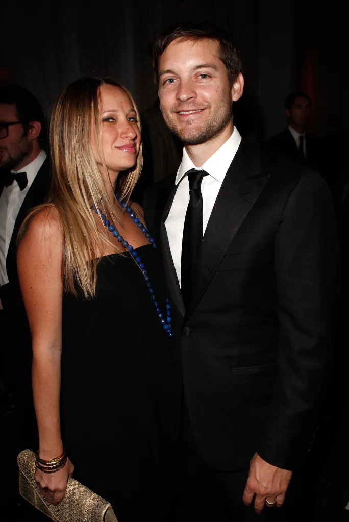 Actor Tobey Maguire and his wife Jennifer Meyer smiling at an event.