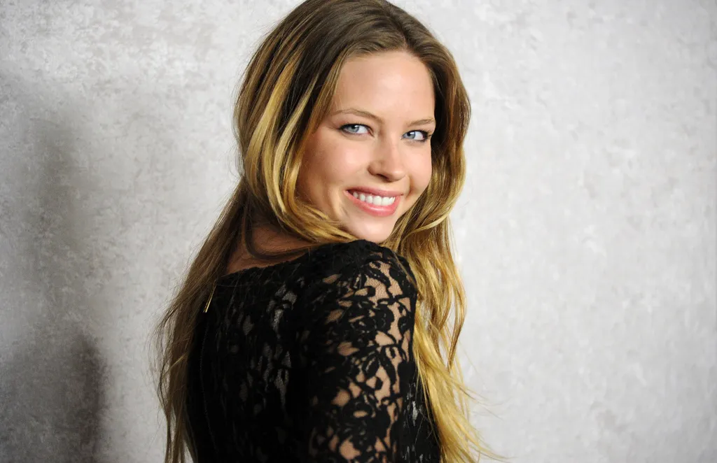 Actress Daveigh Chase smiling at the premiere of HBO's