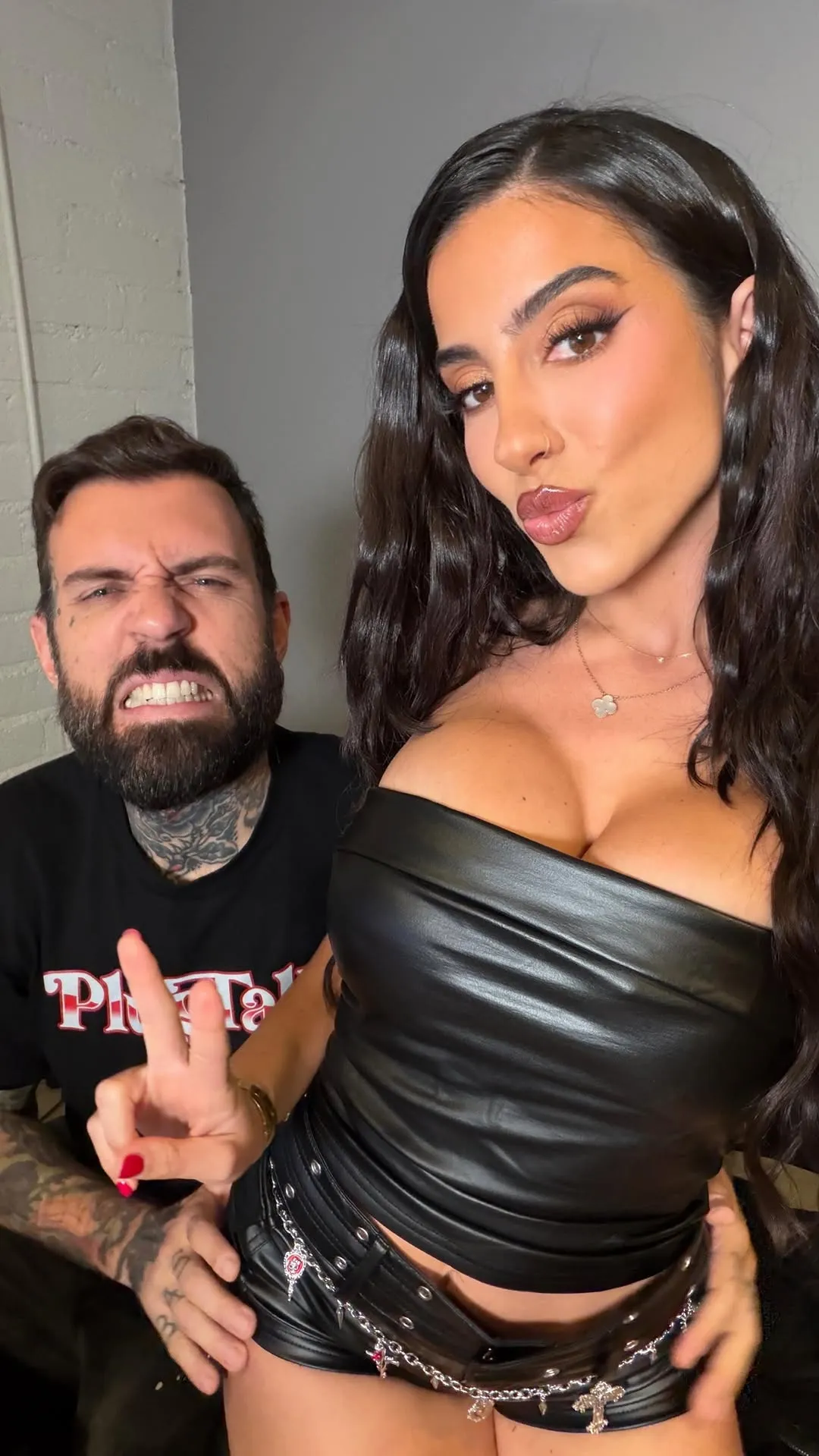 Adam22 and Lena the Plug posing for a selfie.
