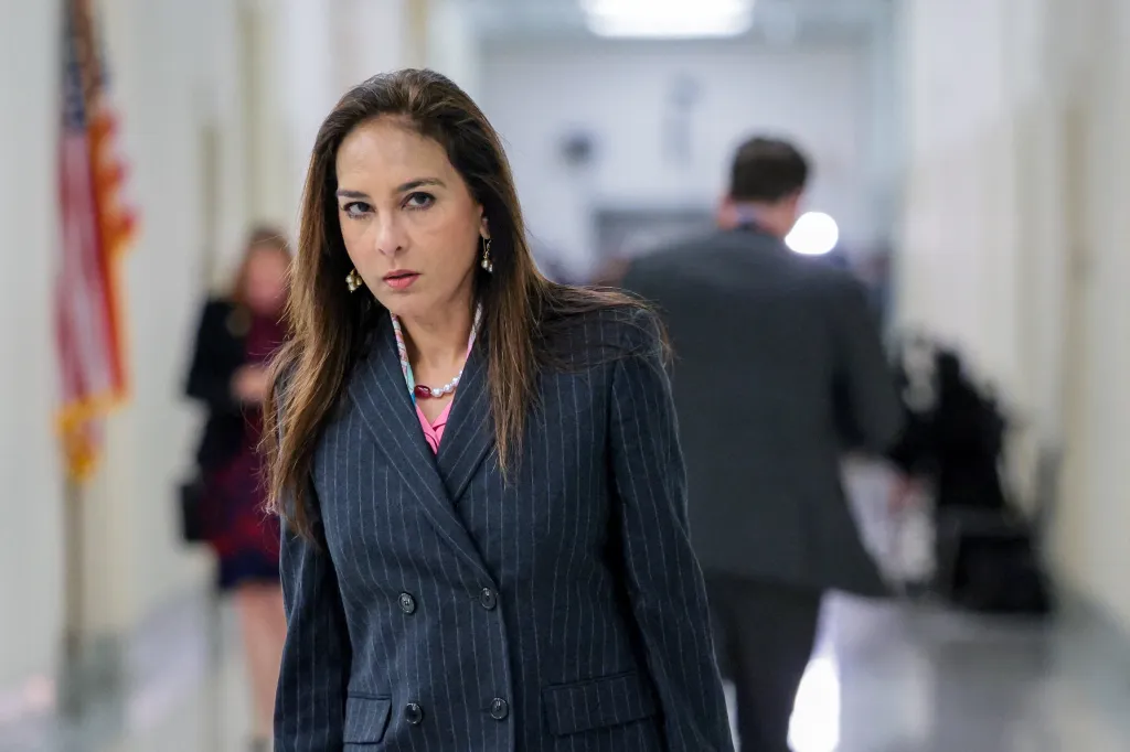 Assistant Attorney General for the Civil Rights Division Harmeet Dhillon walking in a hallway on Capitol Hill.