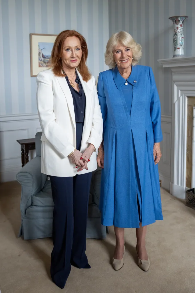 Britain's Queen Camilla and author J.K. Rowling standing together during an audience at the Palace of Holyroodhouse in Edinburgh.