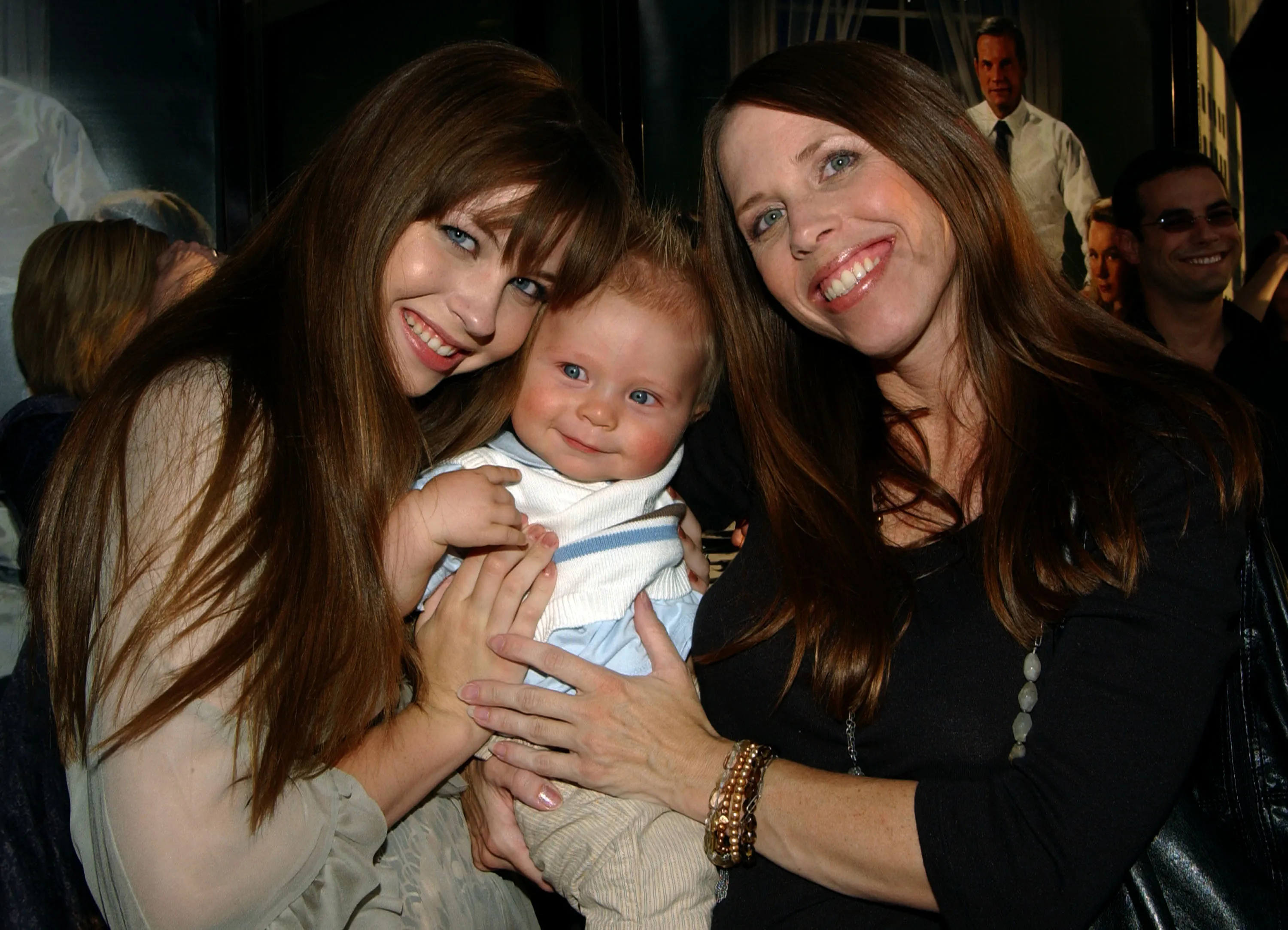 Daveigh Chase, her baby brother, and mother Cathy Chase at the "Big Love" premiere.
