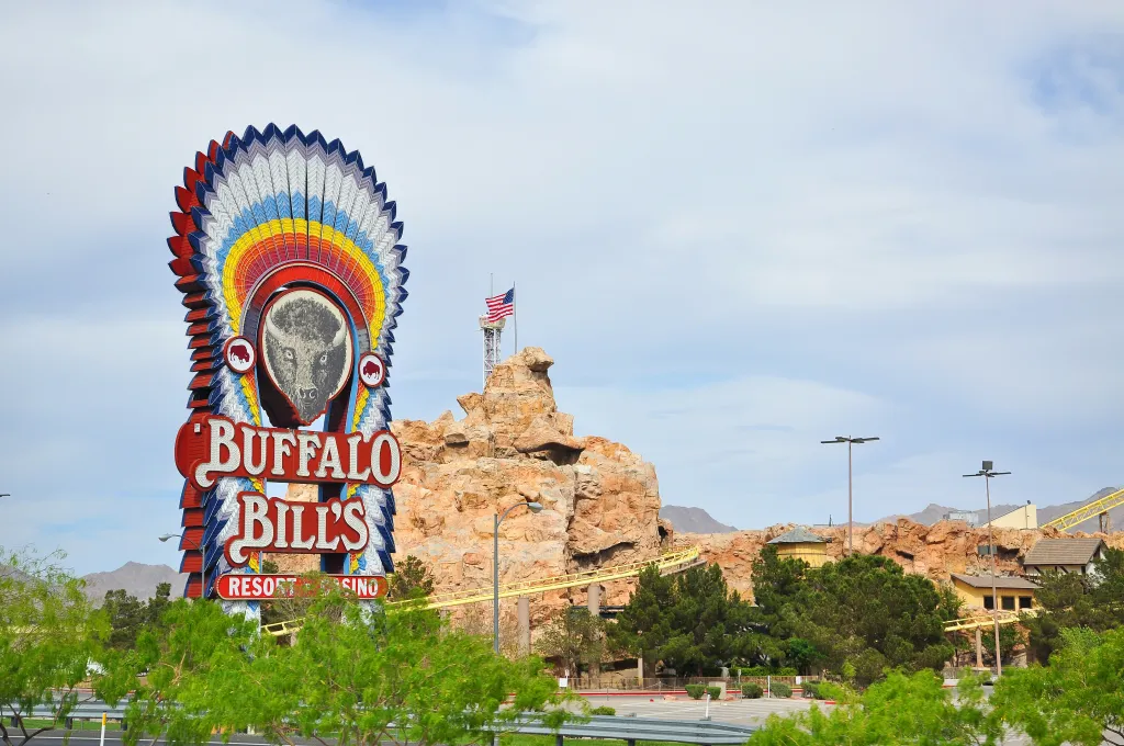 Buffalo Bill's Resort & Casino sign with a native american headdress, a buffalo, and an American flag.