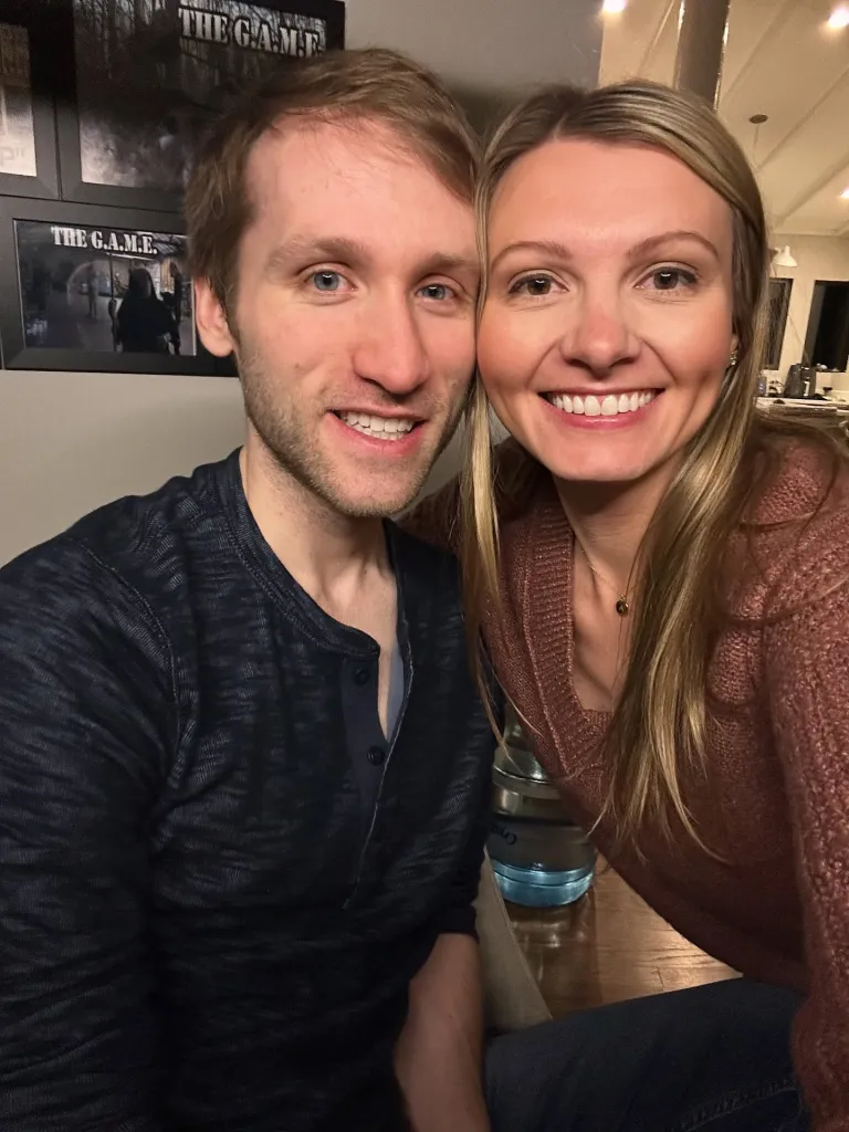Jesse Ridgway and Ashley Ridgway smiling together.