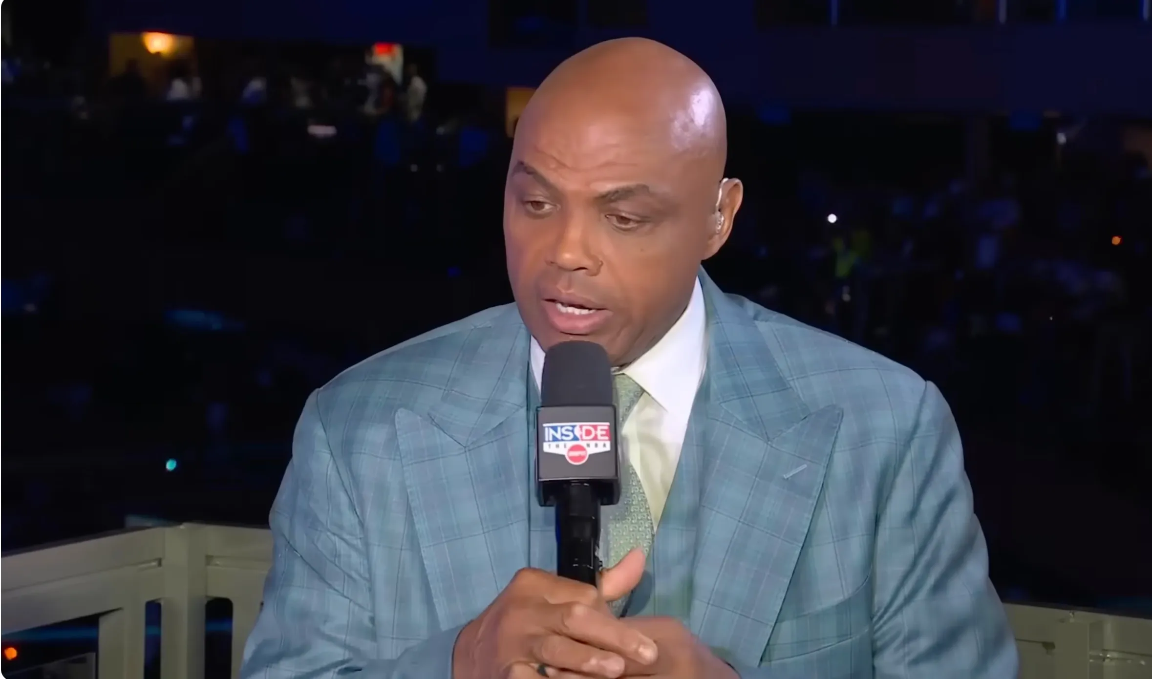 Charles Barkley talking into a microphone during "Inside the NBA" halftime.