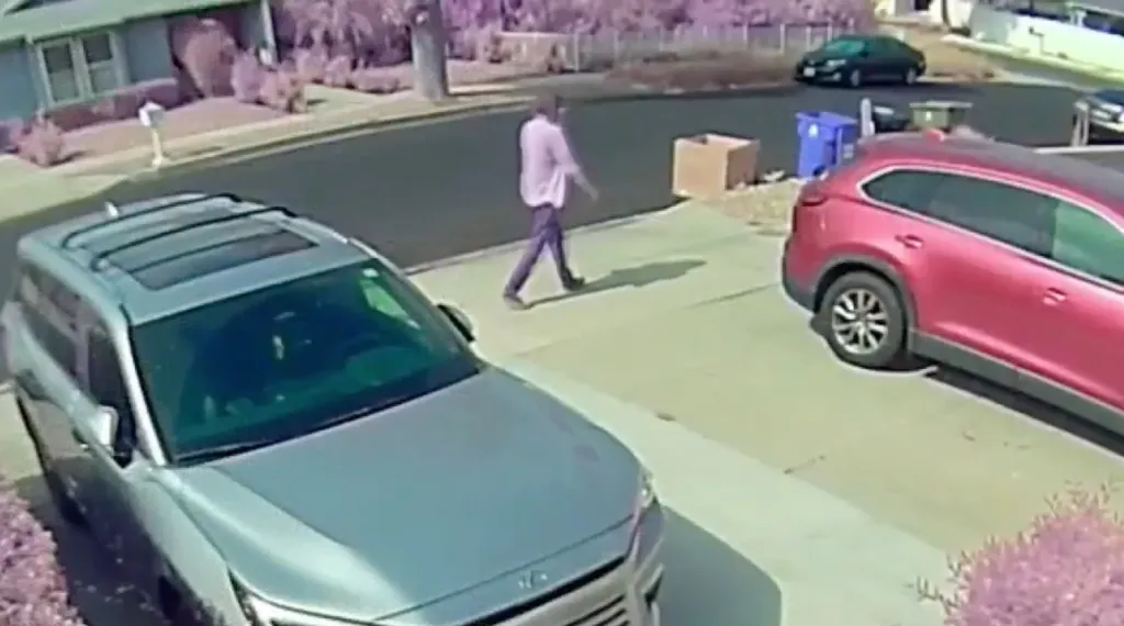 Surveillance footage from the scene showed suspect Michael Gledhill walking past the suburban home before he was later seen returning to the location with police, authorities said.