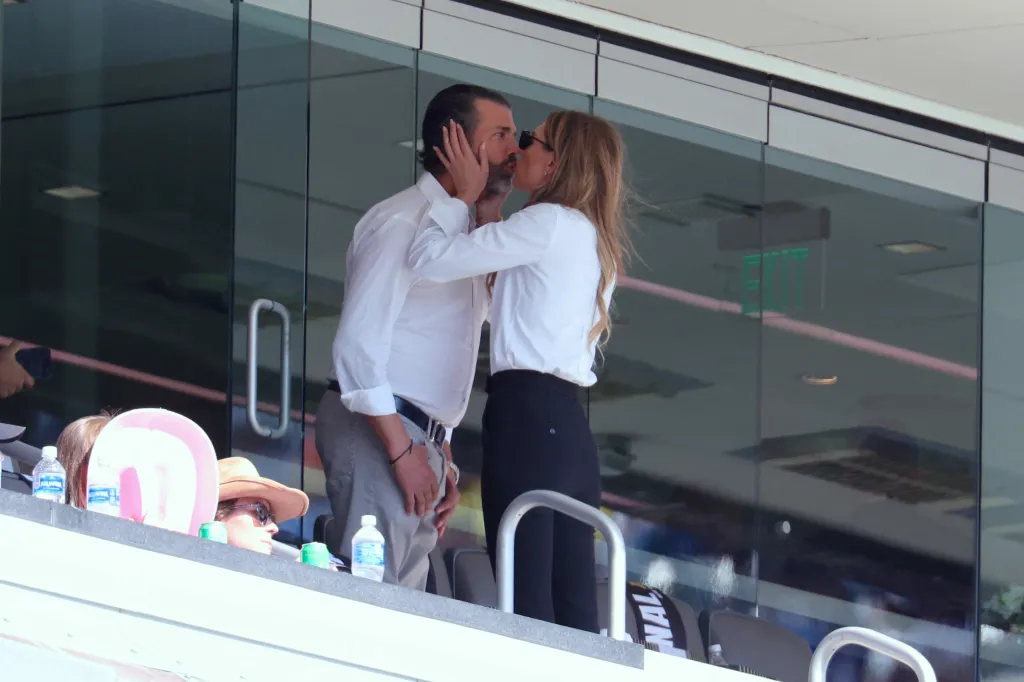 Donald Trump Jr. kissing Bettina Anderson at the FIFA Club World Cup.