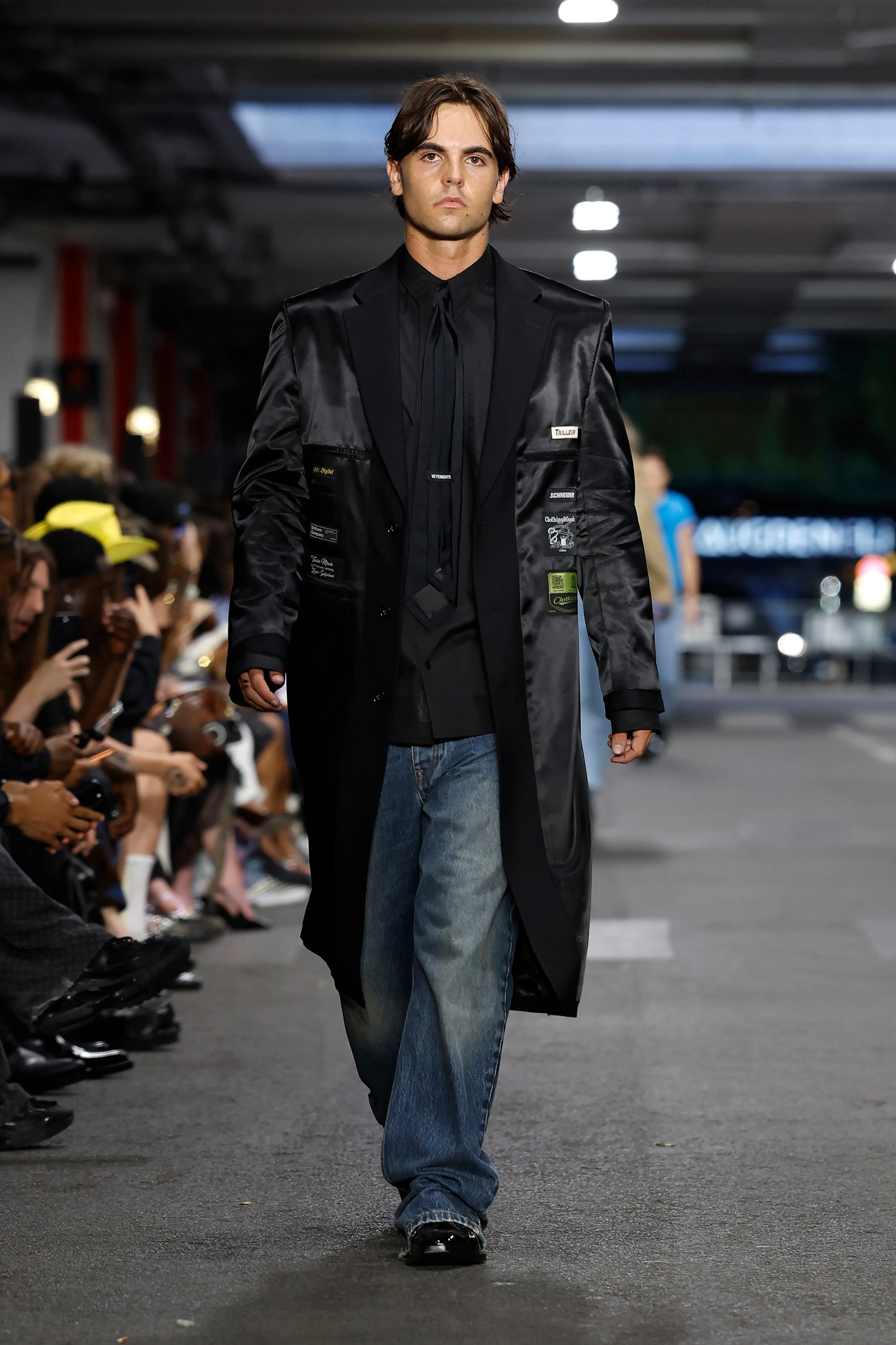 Sean Preston modeling a black suit jacket for Vetements Menswear Spring/Summer 2027 show.