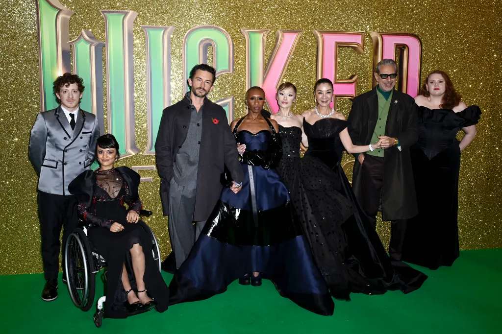 Ethan Slater, in a silver jacket, black pants, Marissa Bode, in a black gown,Jonathan Bailey, in a black coat and grey suit, Cynthia Erivo, in a black gown, Ariana Grande, in a black gown, Michelle Yeoh, in a black gown, Jeff Goldblum,in a black suit and green vest, and Bronwyn James, in a black gown, at the "Wicked: For Good" European Premiere.