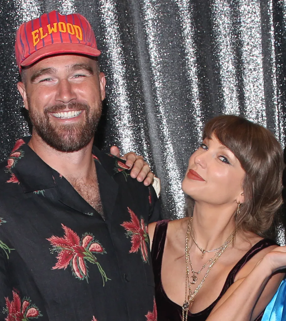 Travis Kelce and Taylor Swift posing backstage at "Oh, Mary!"
