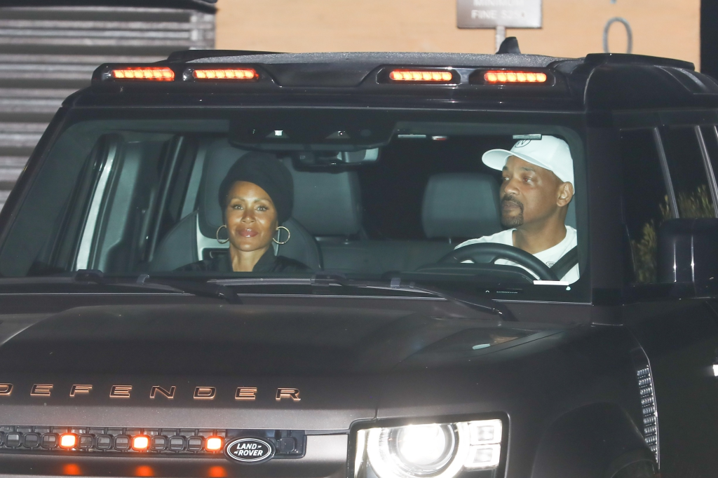 Will Smith driving a car with Jada Pinkett Smith in the passenger seat after dinner at Nobu Malibu.