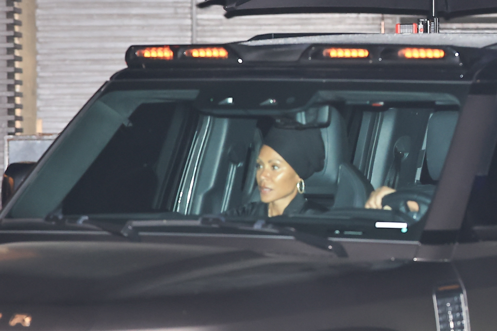 Jada Pinkett Smith driving a car at night.
