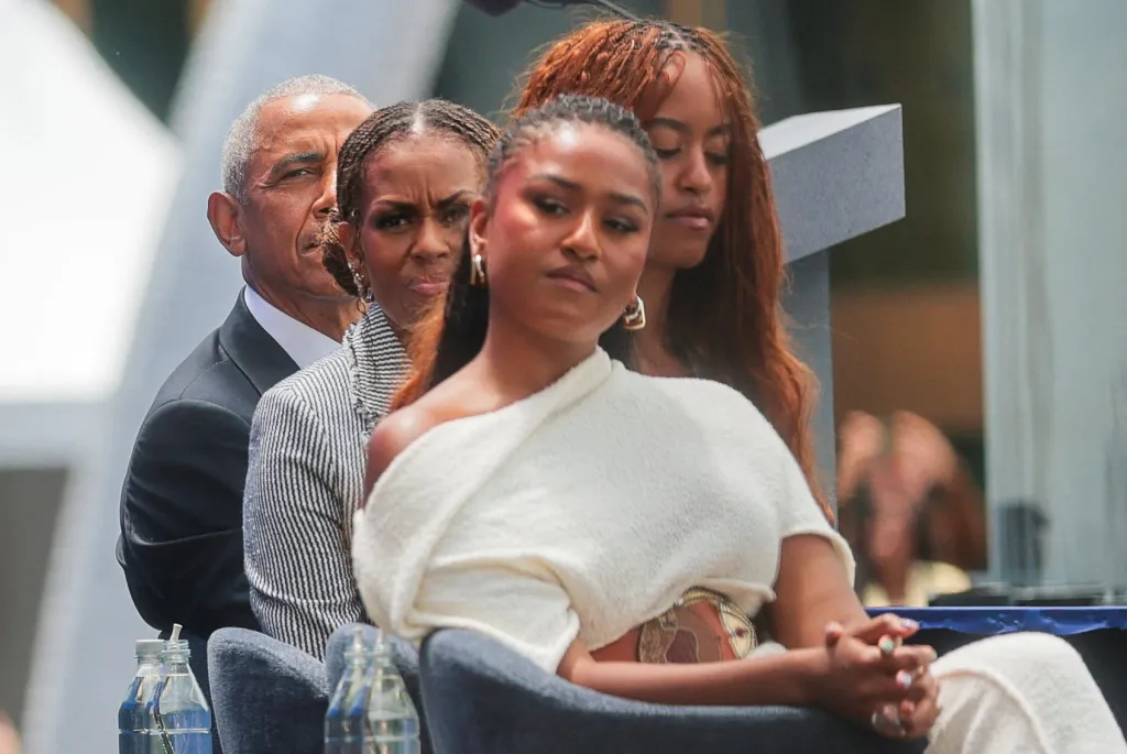 Barack Obama, Michelle Obama, and their daughters Malia and Sasha attend the dedication ceremony for the Obama Presidential Center.