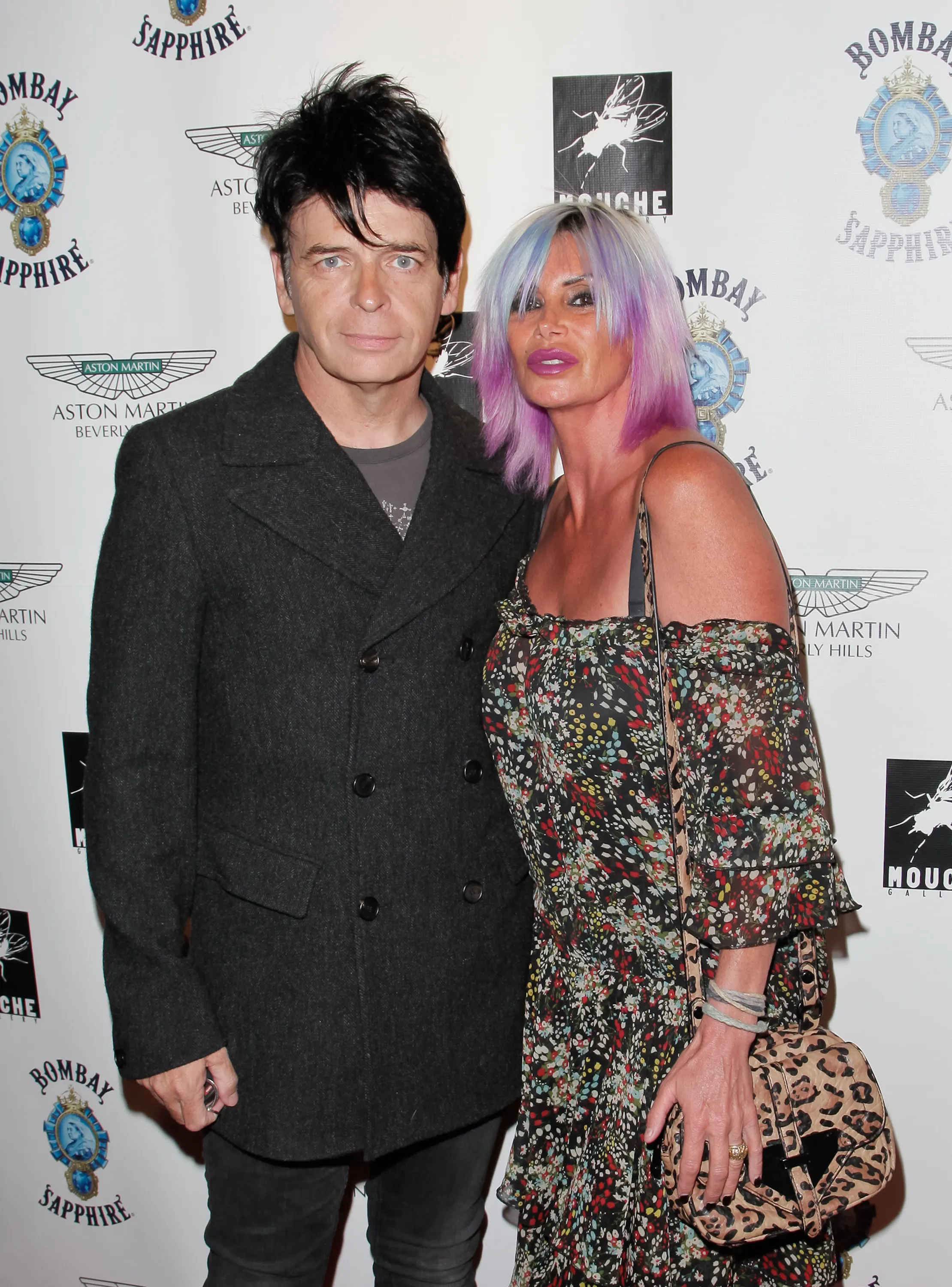 Gary Numan and Gemma O'Neill posing for a photo.