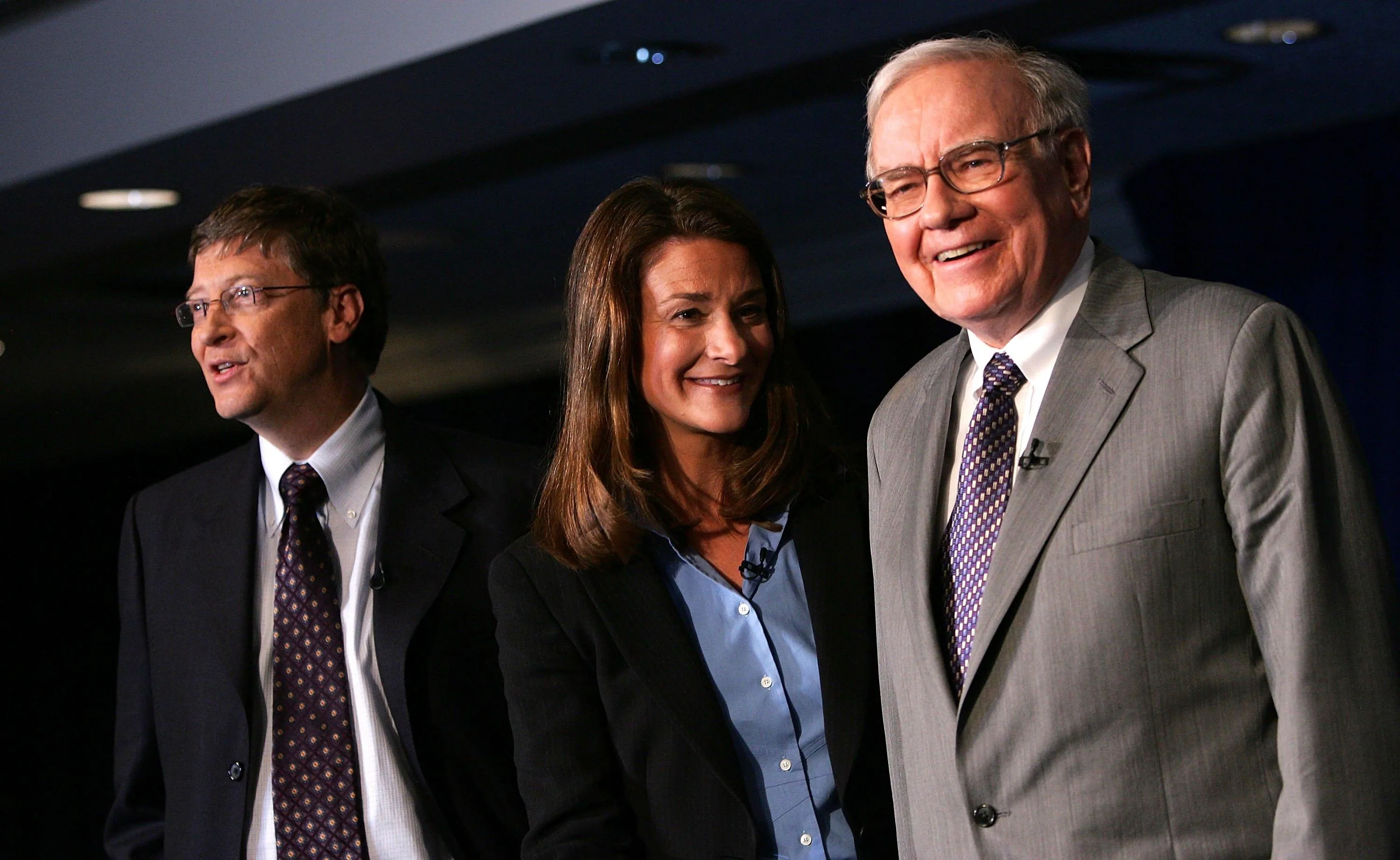 Bill Gates, Melinda French Gates, and Warren Buffett smiling Bill Gates, Melinda French Gates, and Warren Buffett smiling