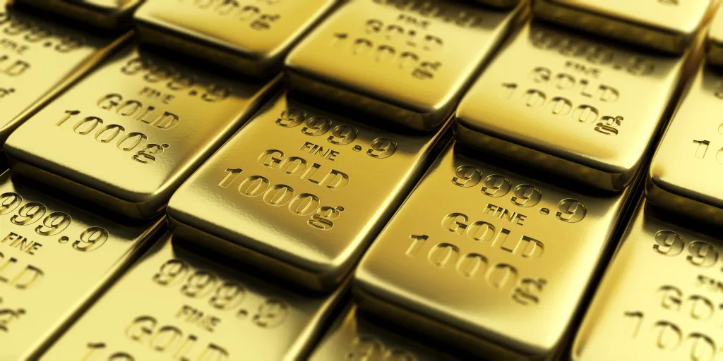 Illustration of multiple rows of shiny gold bullion bars.