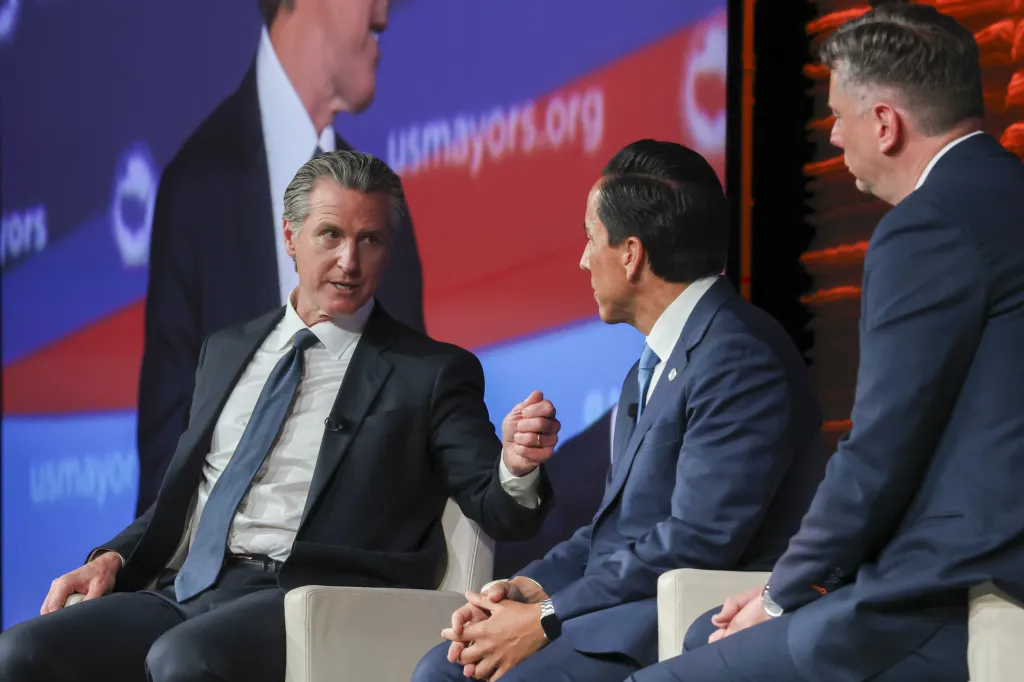 California Governor Gavin Newsom, San Diego Mayor Todd Gloria, and Oklahoma City Mayor David Holt at the 94th Annual Meeting of the United States Conference of Mayors.