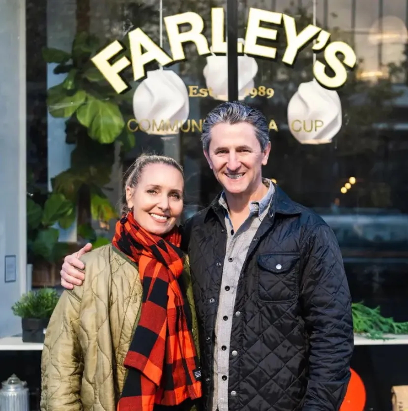 The Hillyards, owners of Farley's Coffee in San Francisco, pose in front of their shop.