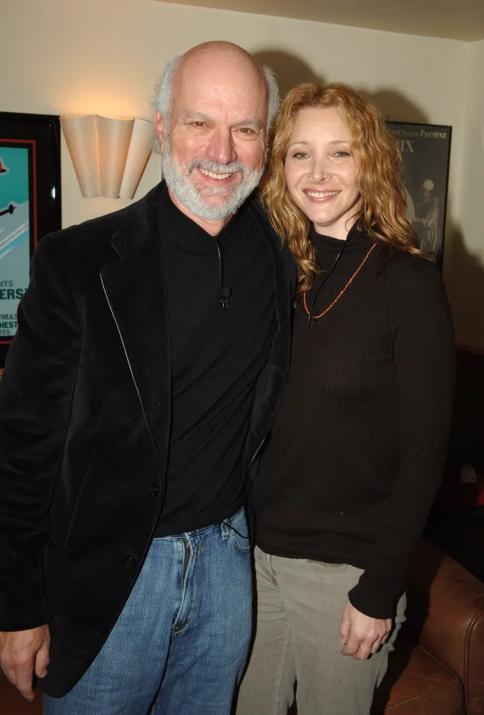 James Burrows and Lisa Kudrow smiling.