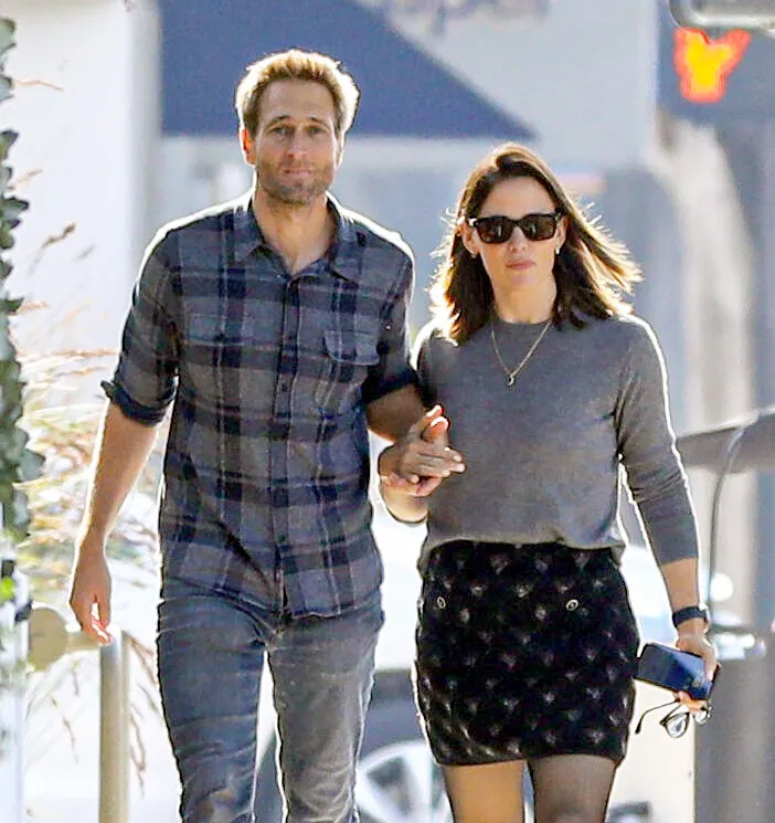 Jennifer Garner and John Miller holding hands during a Santa Monica day date.