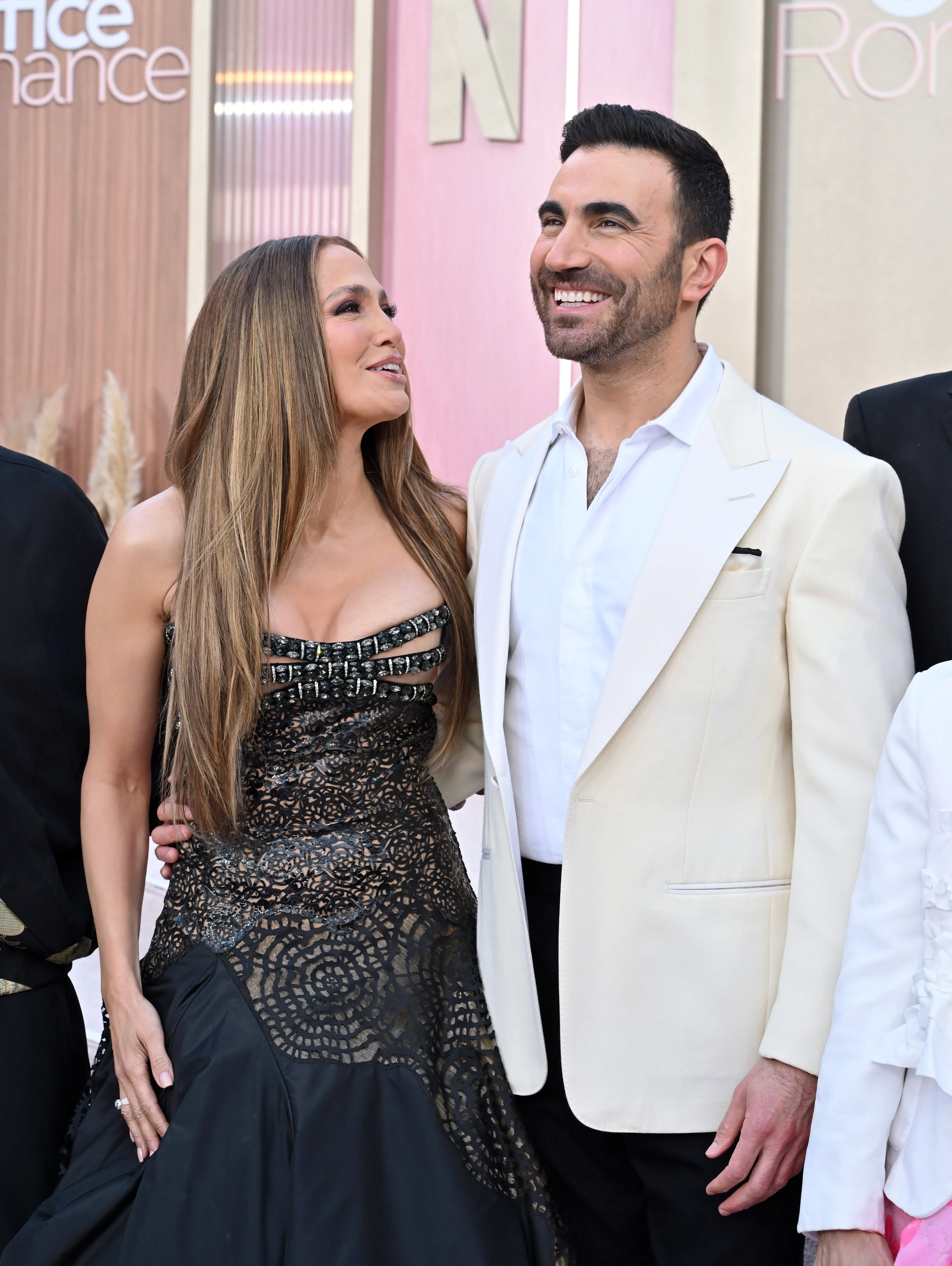 Jennifer Lopez and Brett Goldstein at the "Office Romance" premiere in Los Angeles