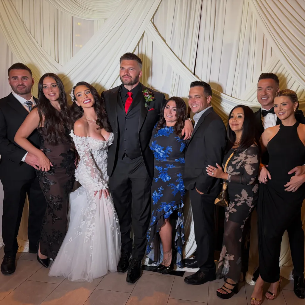 Jenni "JWoww" Farley and Zack Clayton Carpinello with friends and family at their wedding.