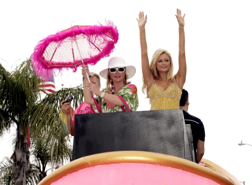 Kathy Hilton and Paris Hilton waving during the 2005 West Hollywood Gay Pride Parade.