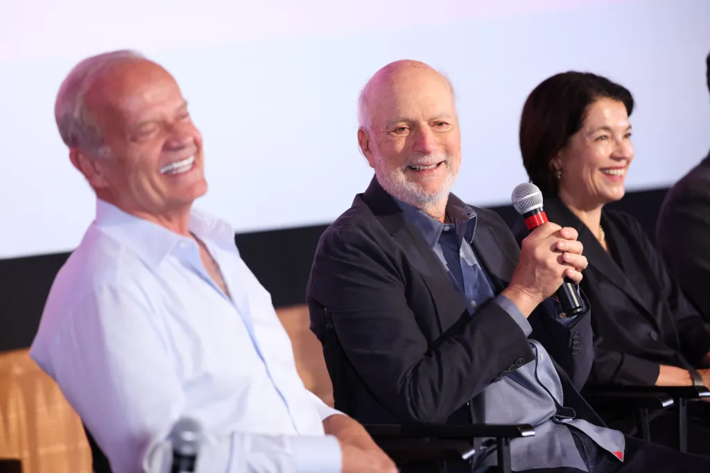 Kelsey Grammer, James Burrows, and Glenda Rovello smiling at the IndieWire & Paramount + Consider This FYC Event.